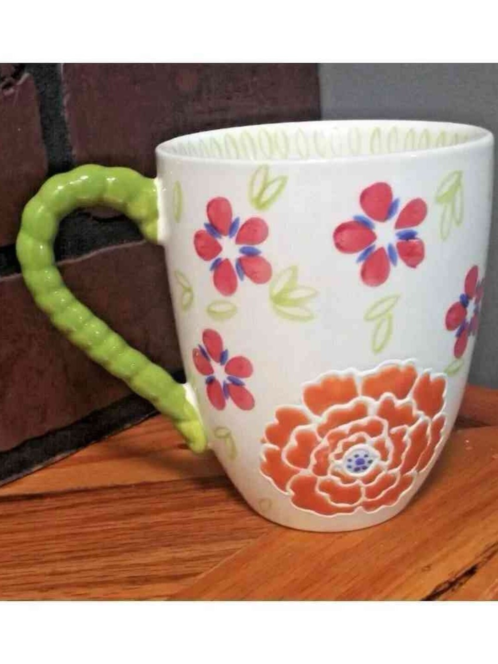Floral Ceramic Mug with Green Twisted Handle